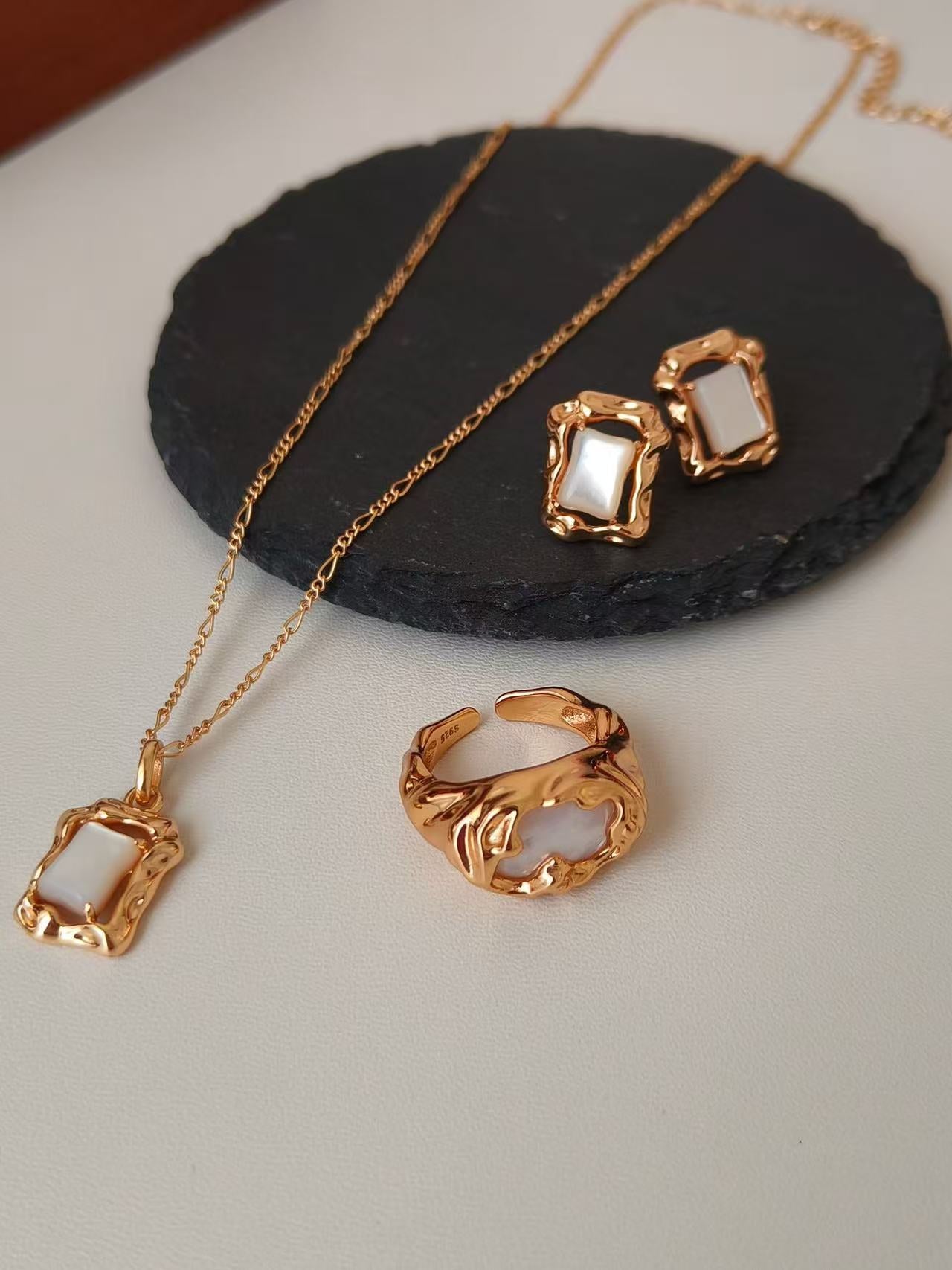 artistic sculpted gold statement ring